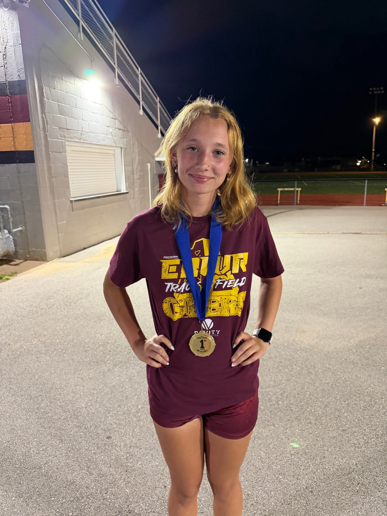 Brooklyn Rexford poses with her 1st place medal