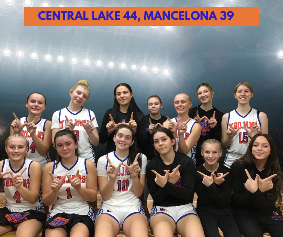 Central Lake Trojans Secure a Victory Against Mancelona Ironmen in a Thrilling Basketball Encounter