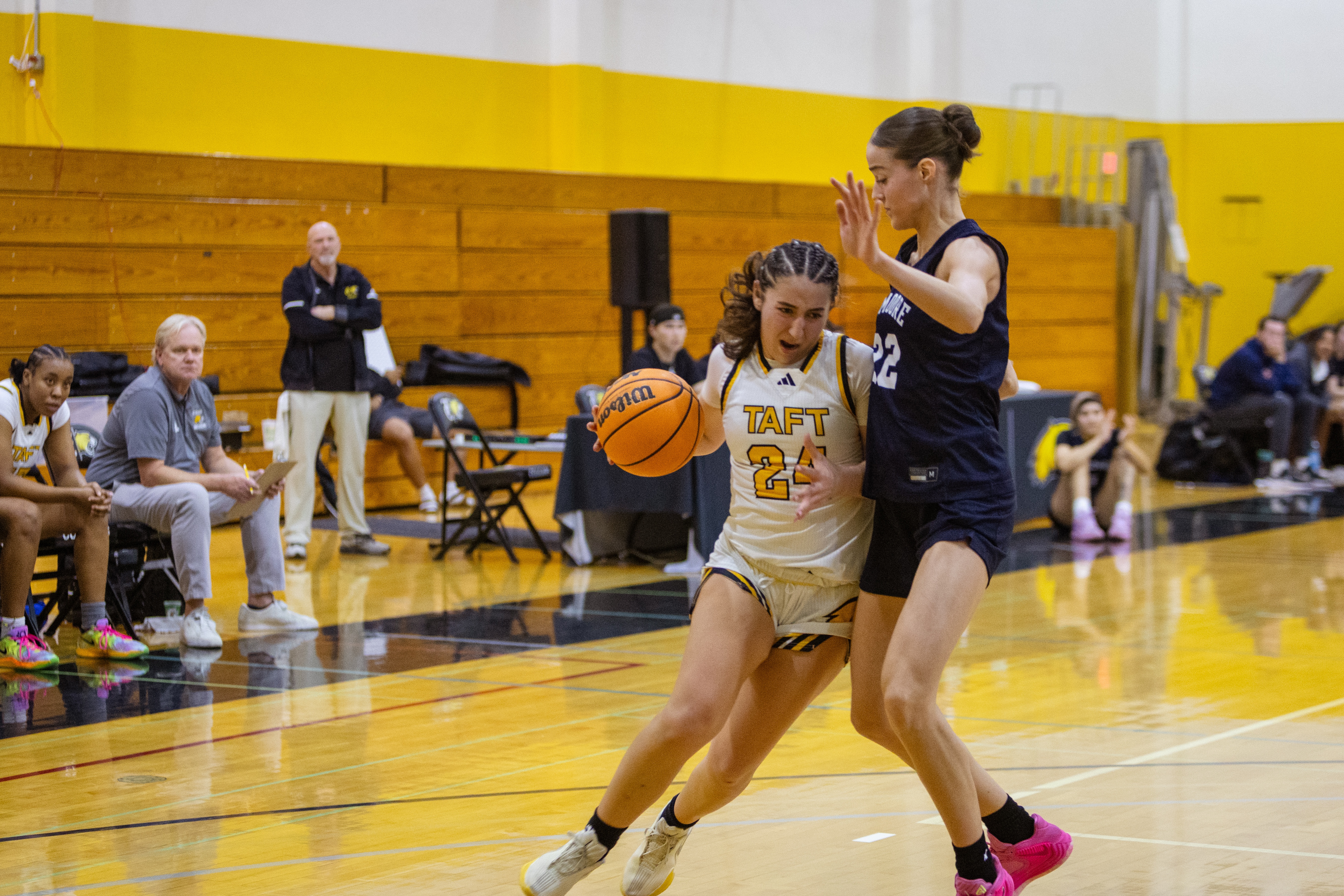 Photo by George Corral. Pictured: Madyn Kassatly driving to the basket.