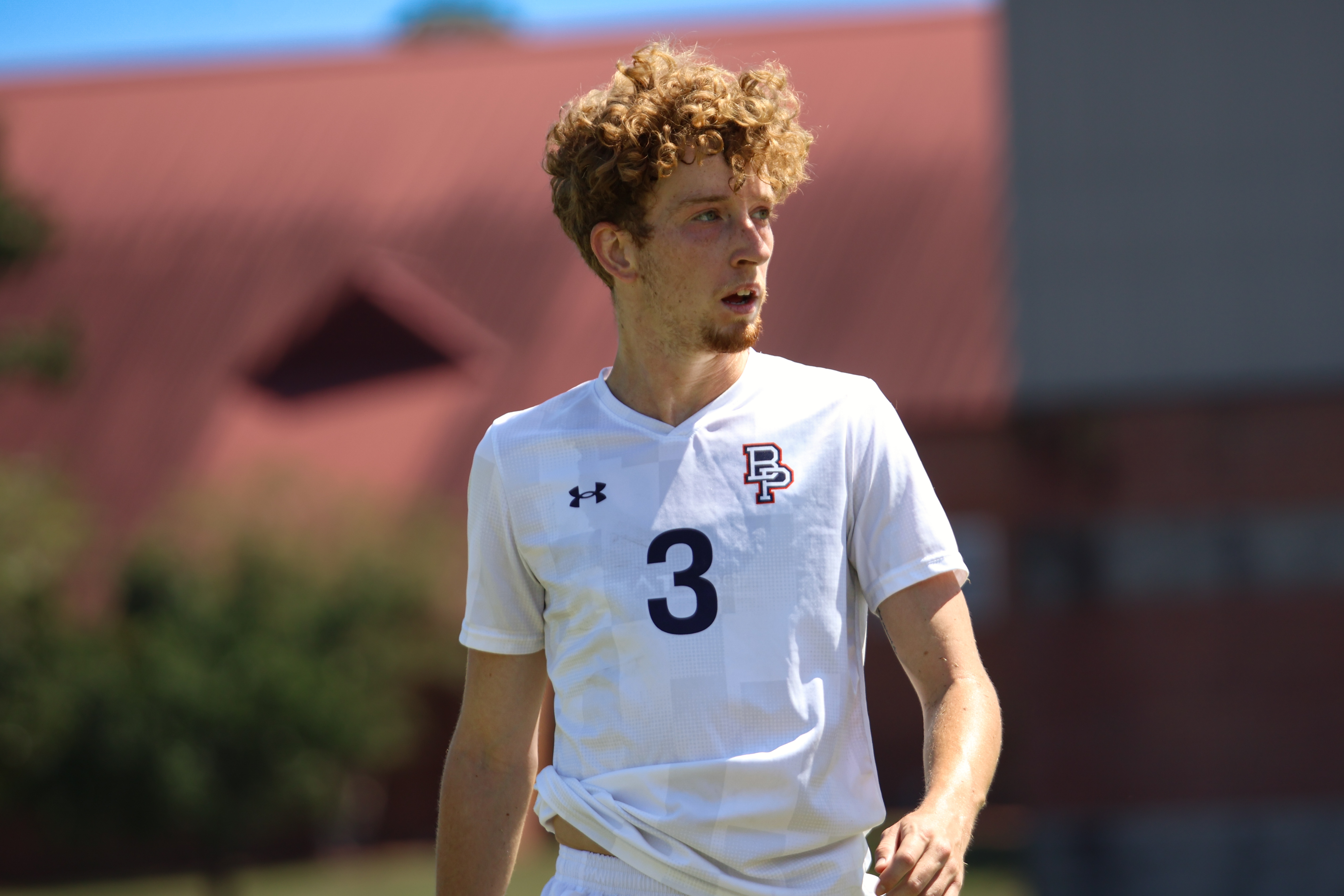 Barons Fall to Toppers in Conference Clash