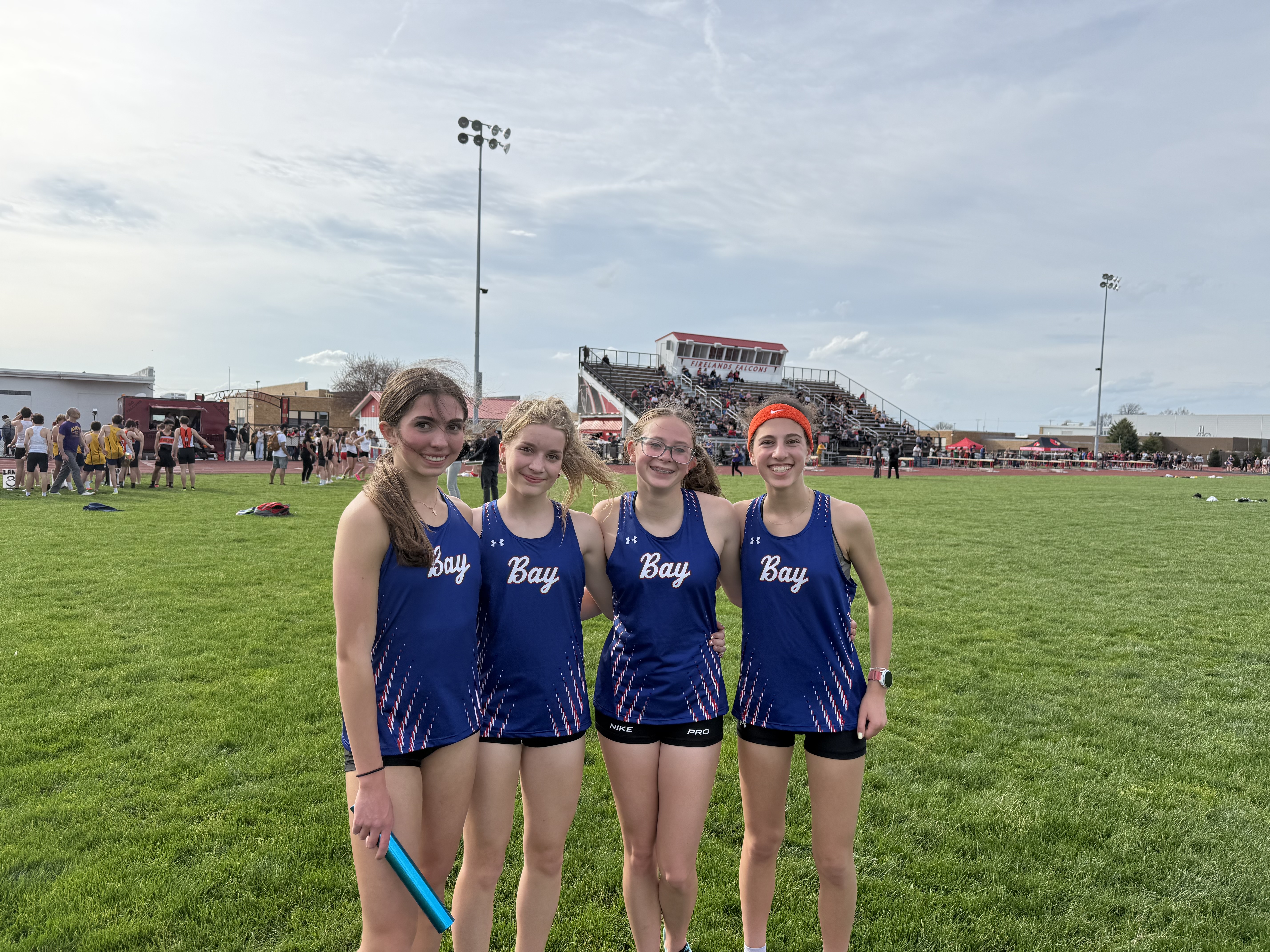 Freshmen Maya, Chloe, Elyse, and Kai start the scoring with a 1st place 4x800 finish!