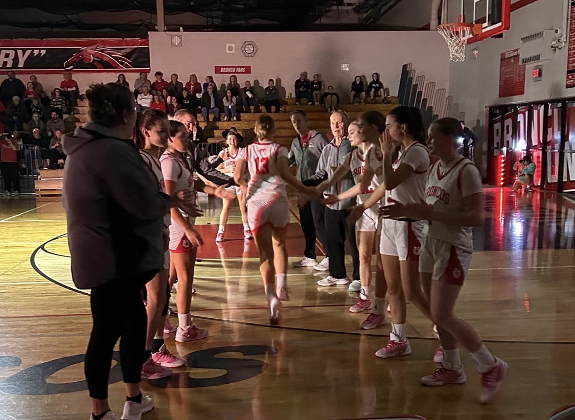 Balanced effort, Smith and Licht power Broncos past Burlington 63-28