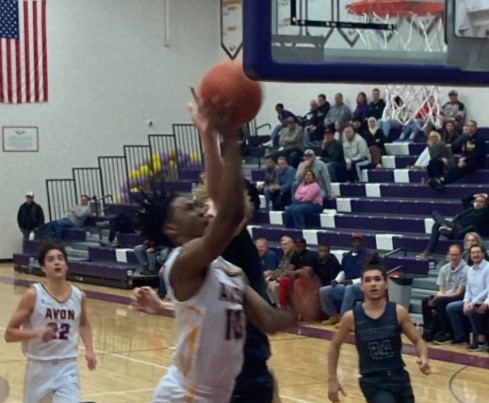 Boys basketball battles its way to overtime victory over Lorain