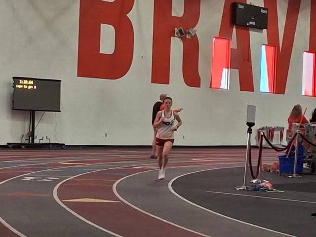 Mckenzie Minner rounds the turn