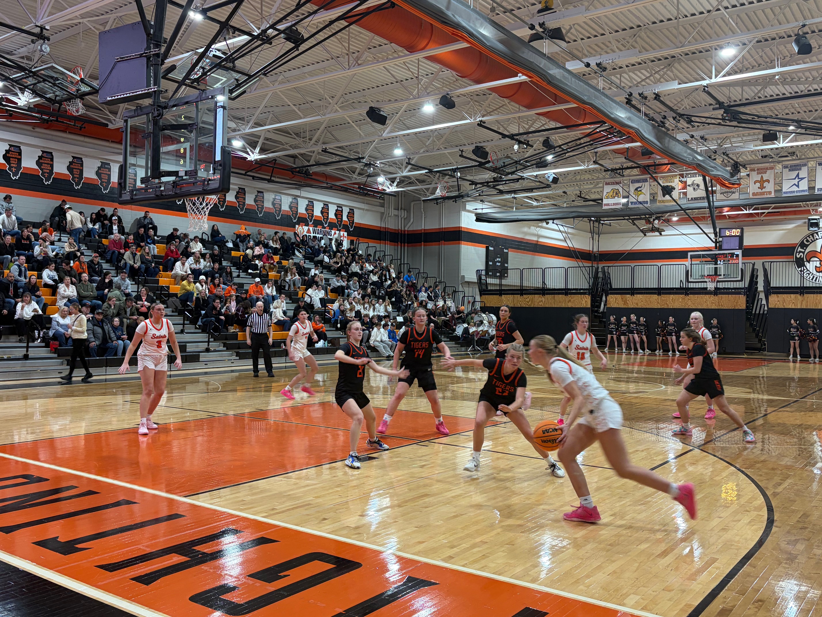 St Charles East High School Fighting Saints Triumph in Basketball Showdown