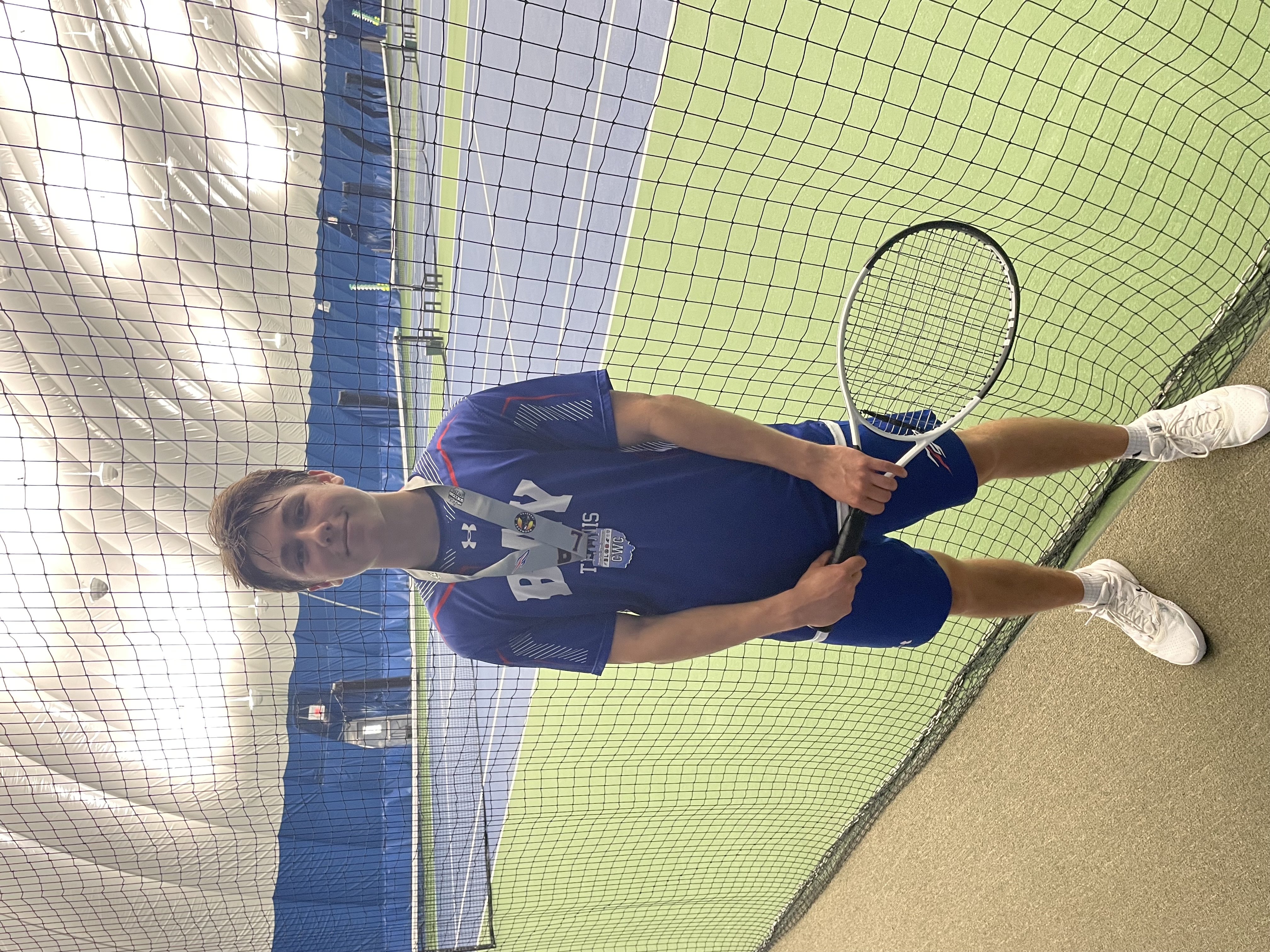 Bay High School Rockets Celebrate Martin Hausler's Victory in Cleveland West Conference Tennis