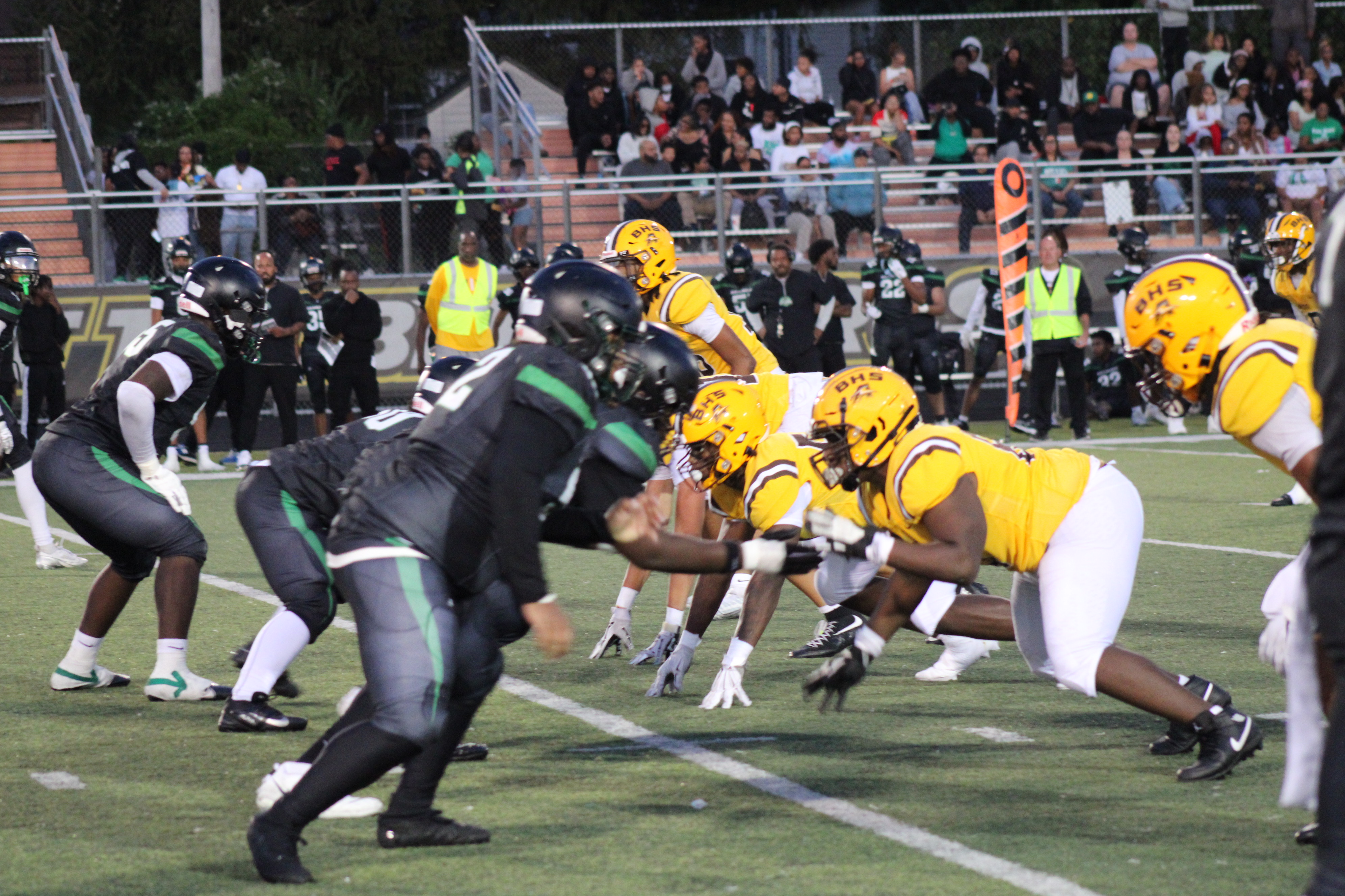 Brush High School Arcs Narrowly Defeat Bedford Bearcats in Thrilling Football Encounter