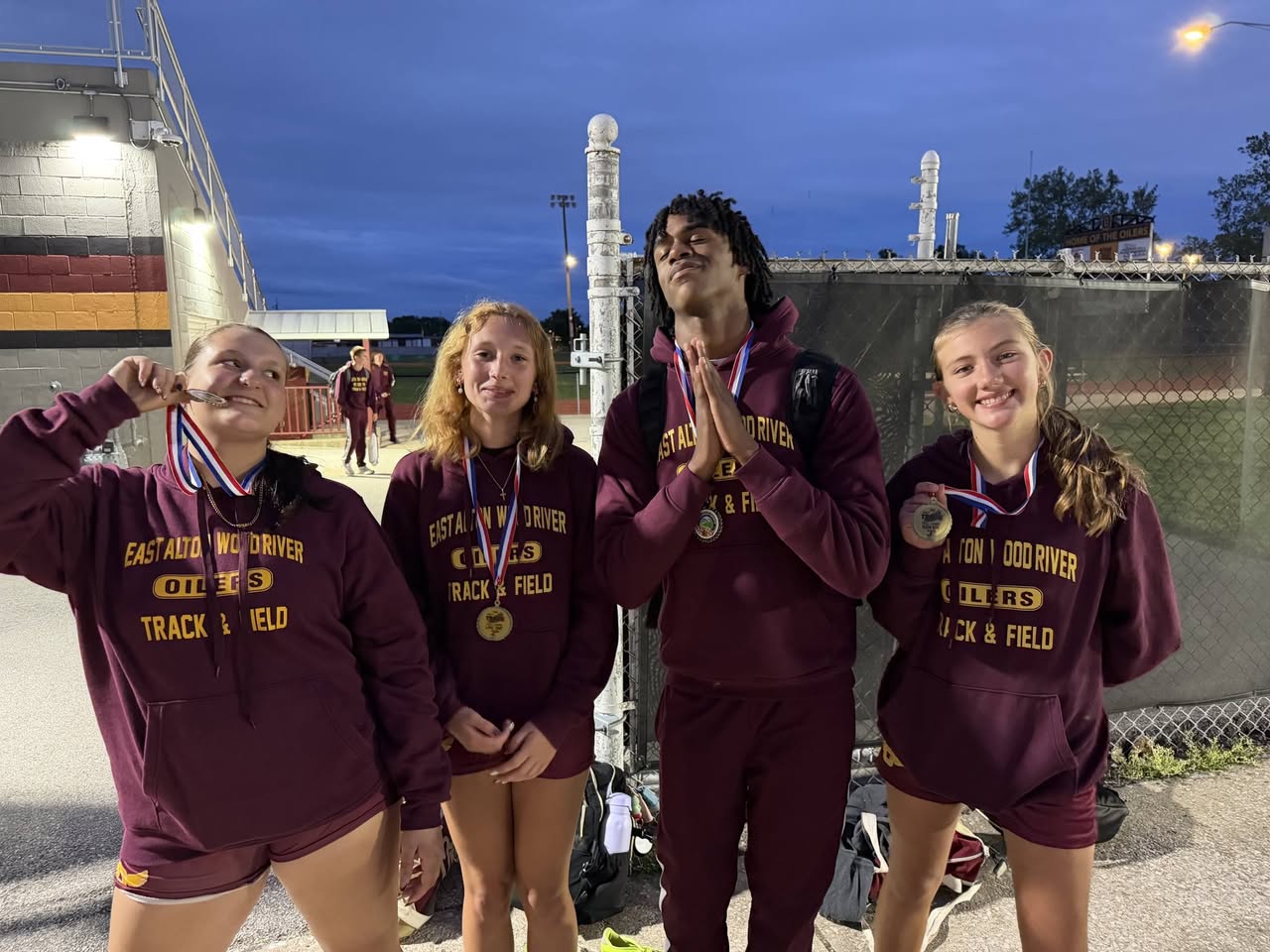 Kylah Wreath, Brooklyn Rexford, Jasiah Brown, and Eleanor Brame pose with their medals.