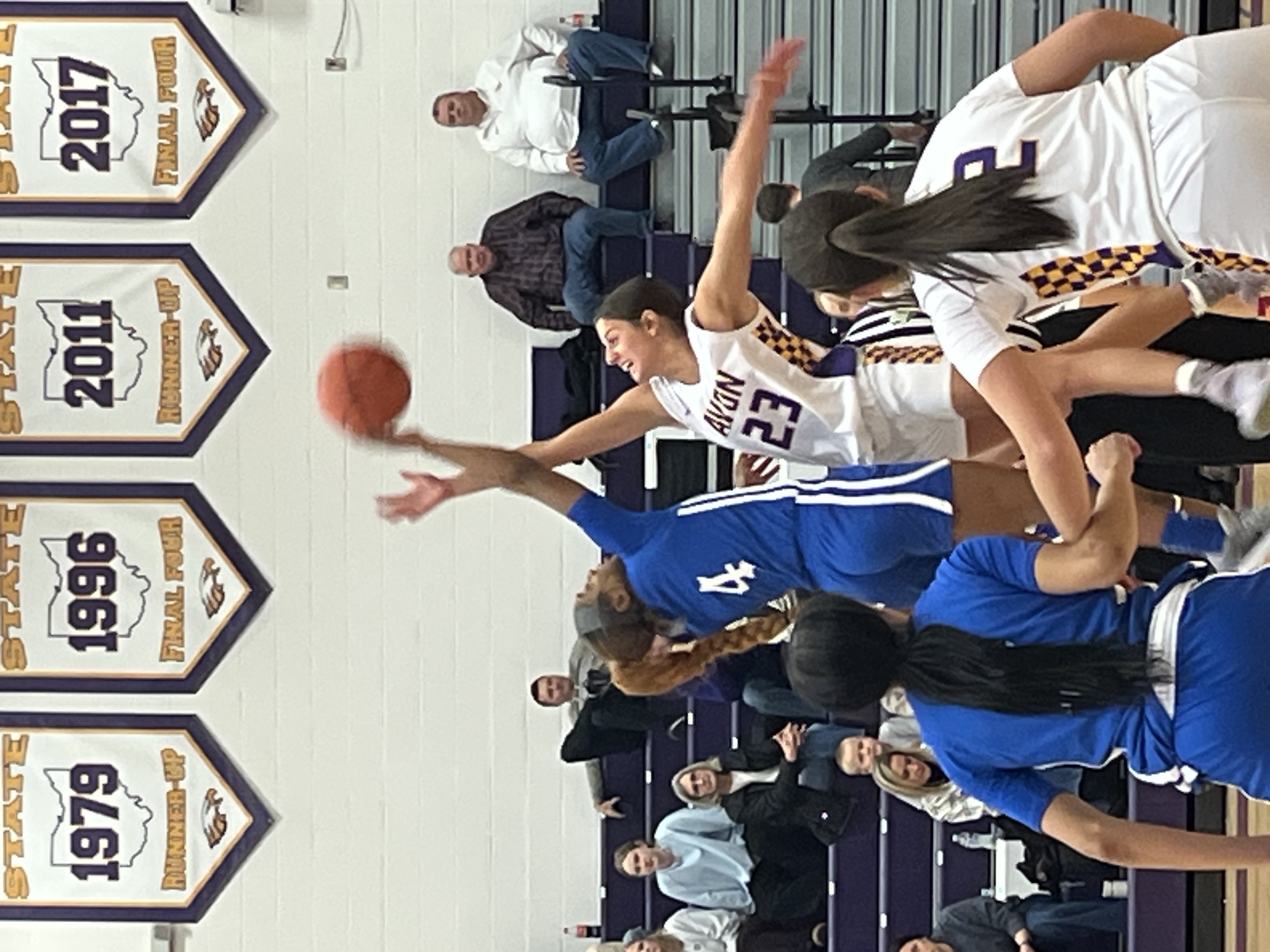 Avon Eagles Secure a Tight Victory Over Trinity Trojans in Varsity Basketball Showdown