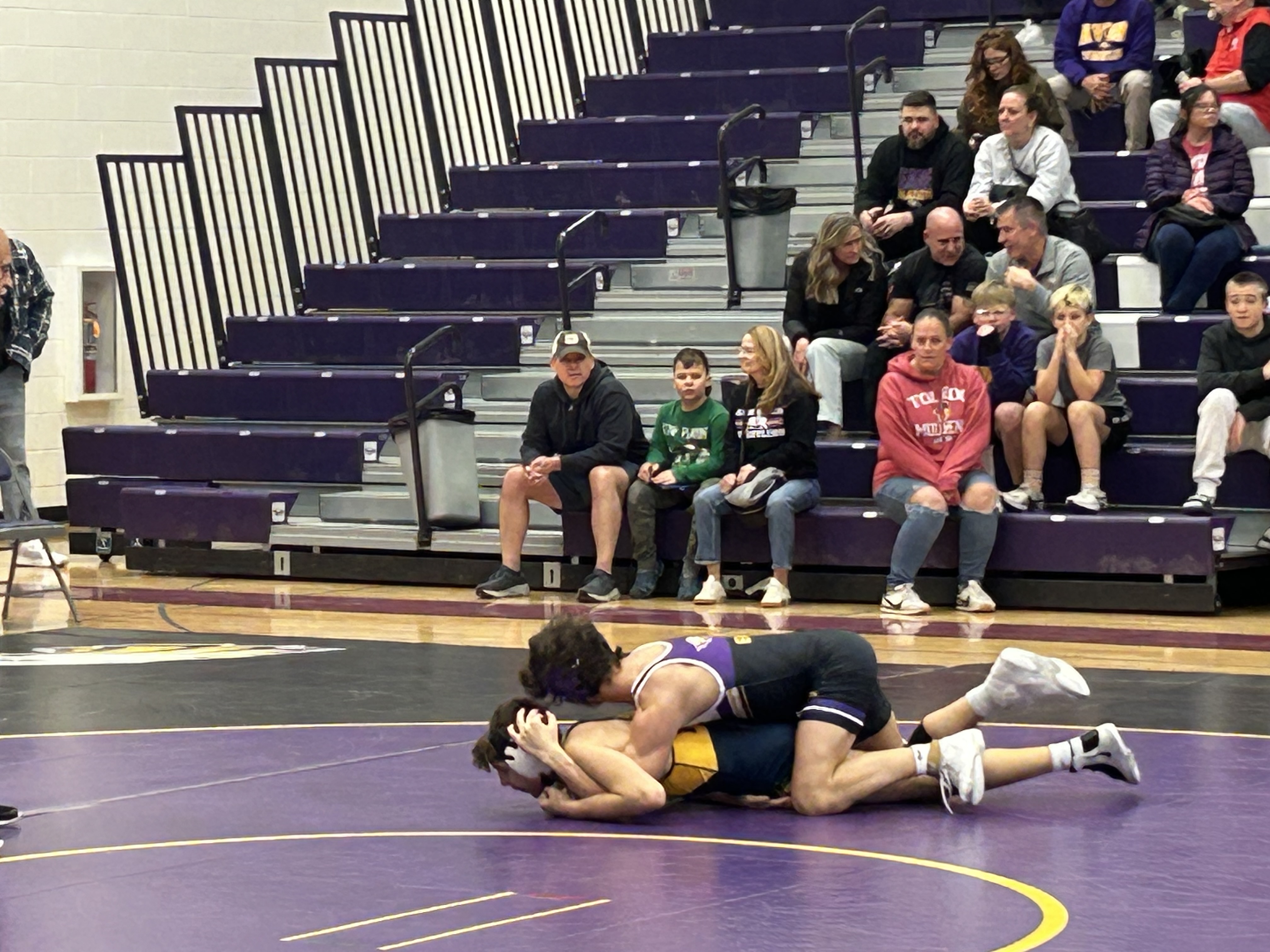 Wrestlers overcome large deficit, defeat Olmsted Falls, 48-30